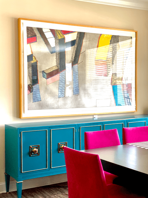 Teal Credenza in a colorful dining room.