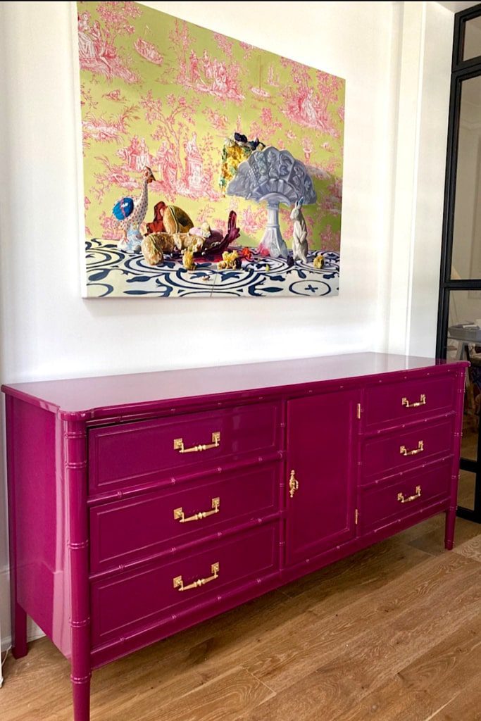 Pink credenza in an entryway