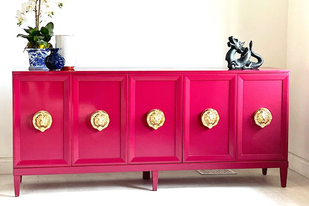 Pink credenza with lion head knobs