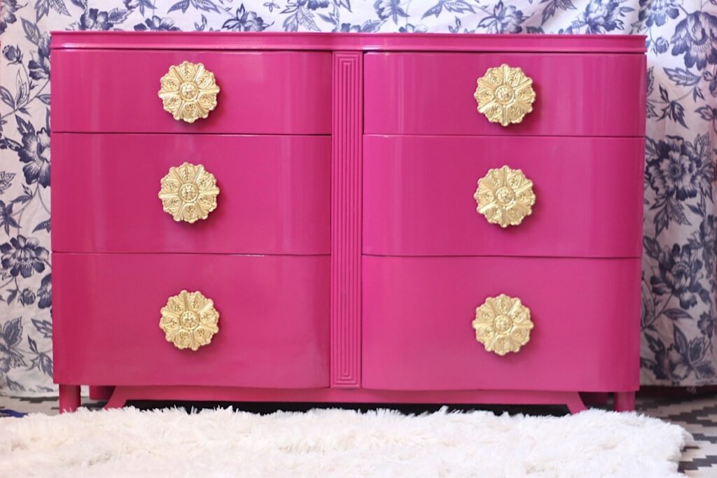 hot pink dresser with brass hardware 