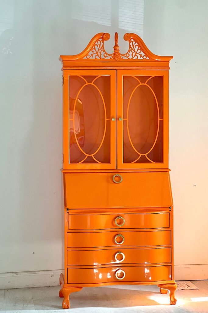 Orange painted secretary cabinet 