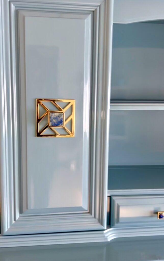 Polished brass hardware with lapis accents 