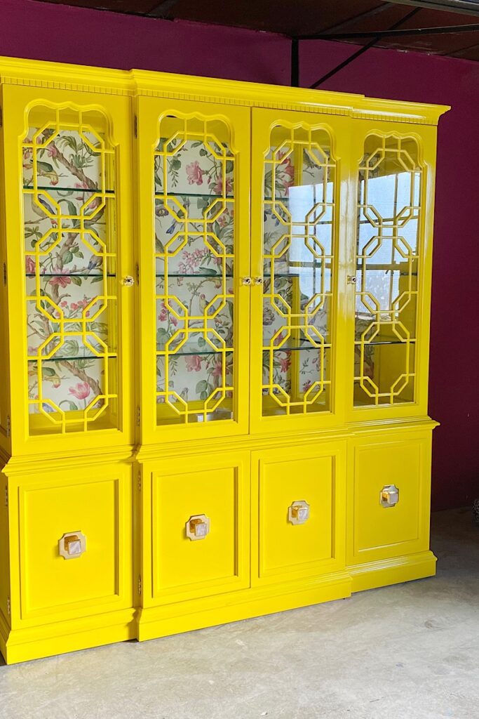 Vintage fretwork china cabinet in yellow