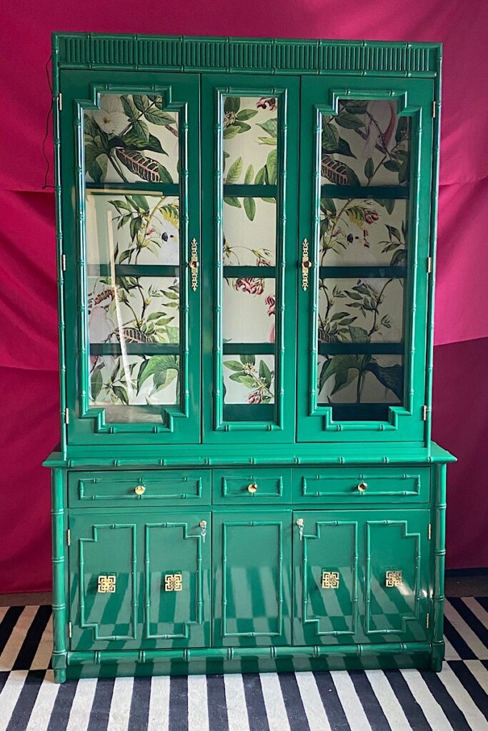 Vintage faux bamboo china cabinet in deep green
