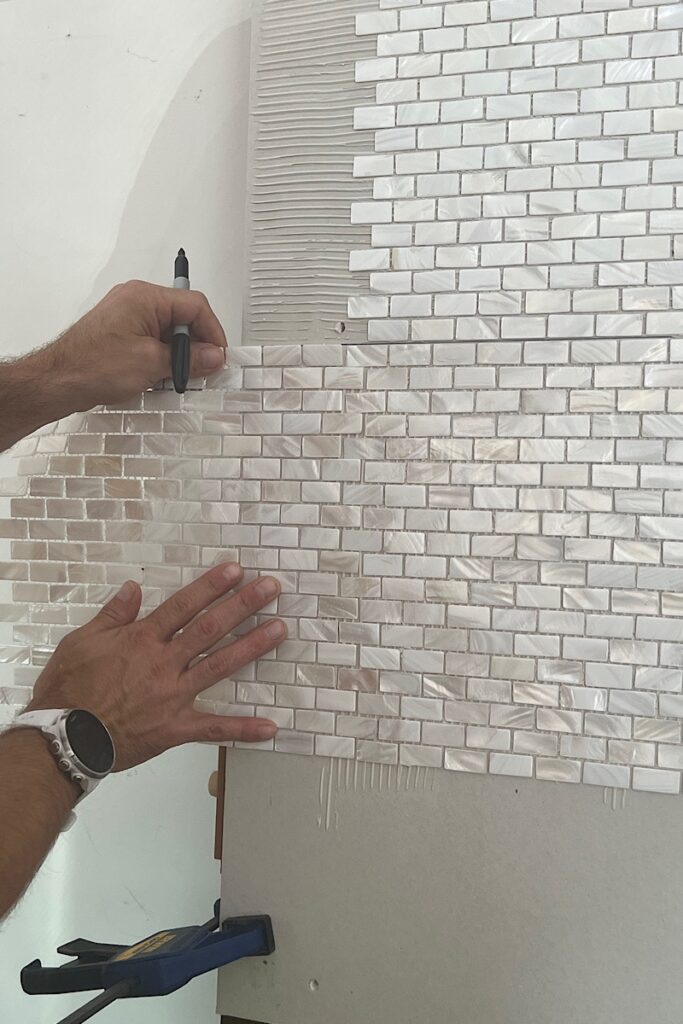 Mark your mother of pearl tile cuts 