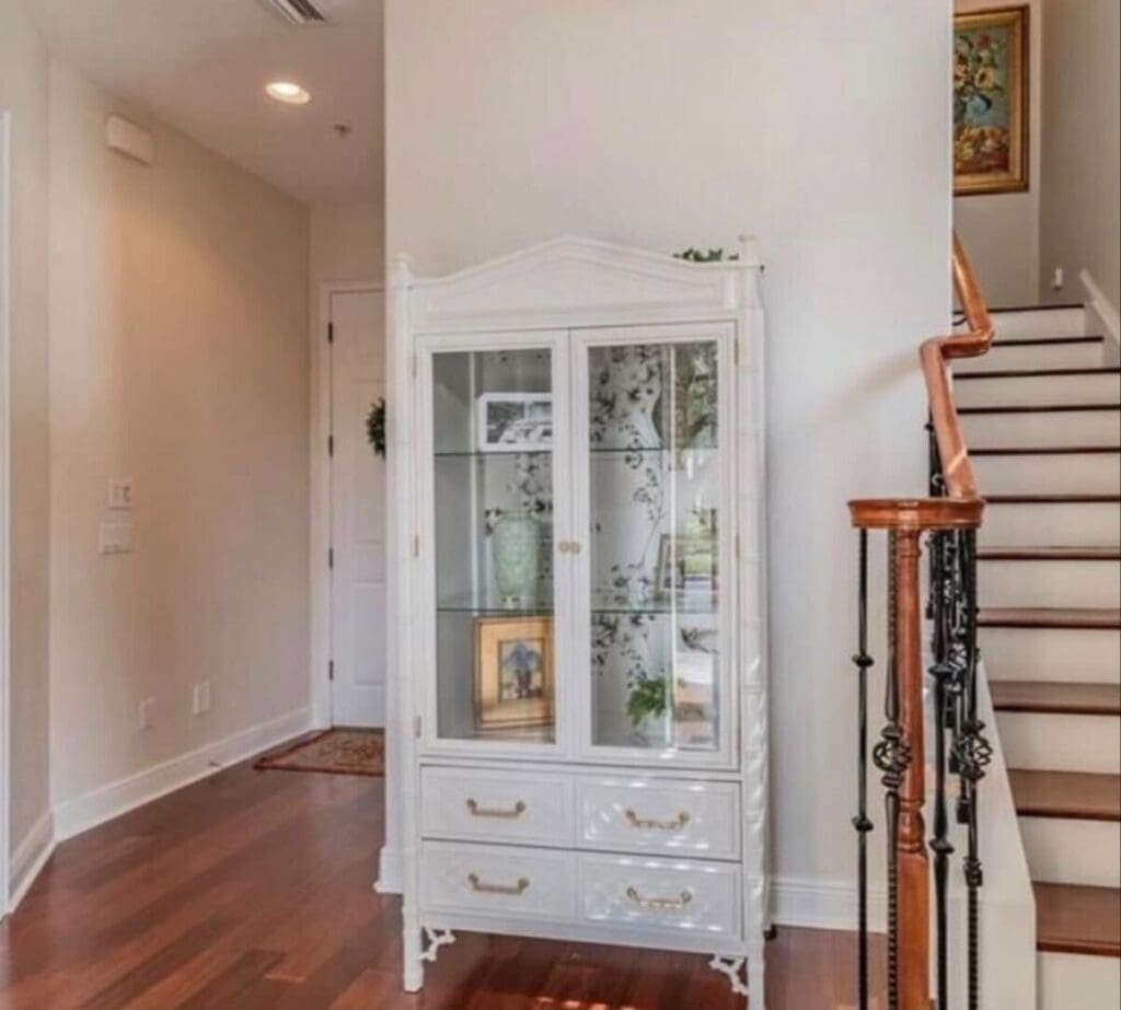 China cabinet in entry way