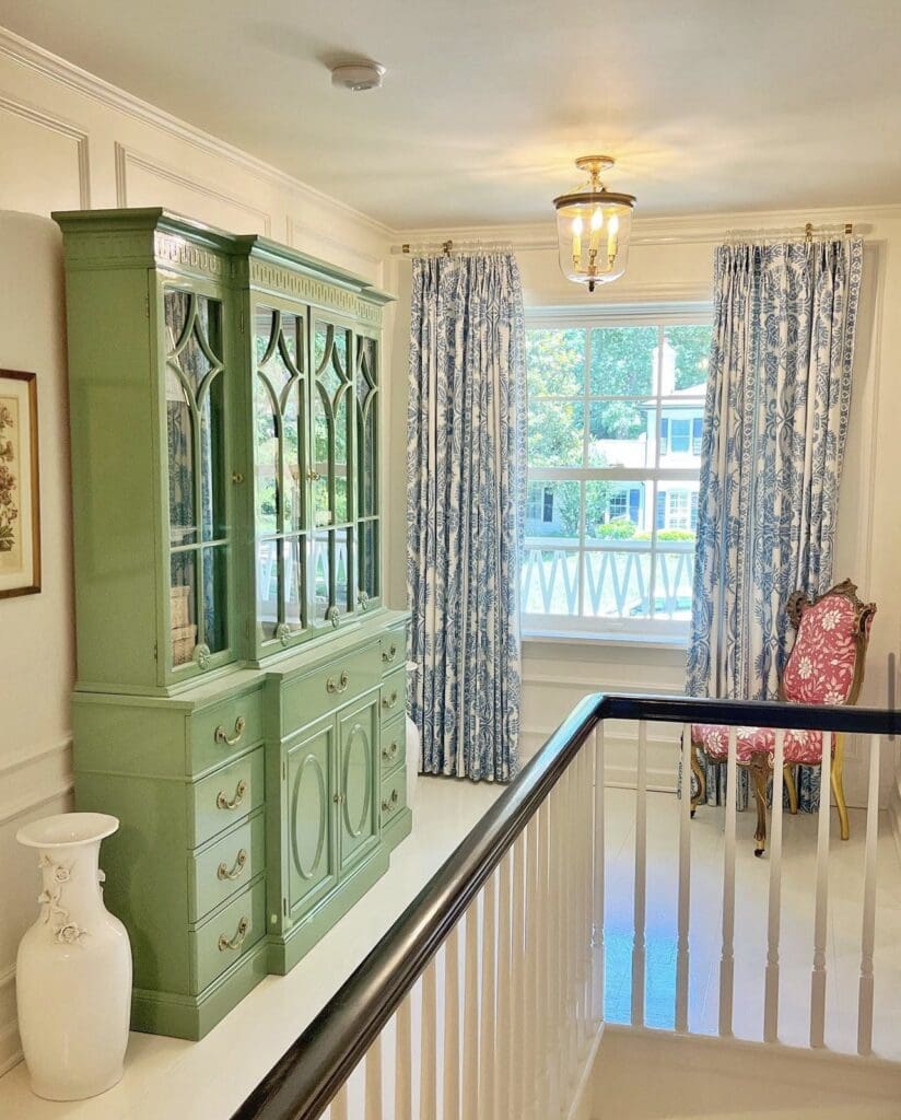 China cabinet in 2nd floor foyer