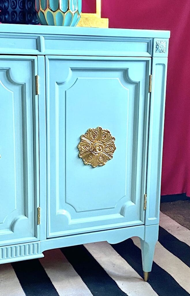 AoM credenza door with gold hardware 