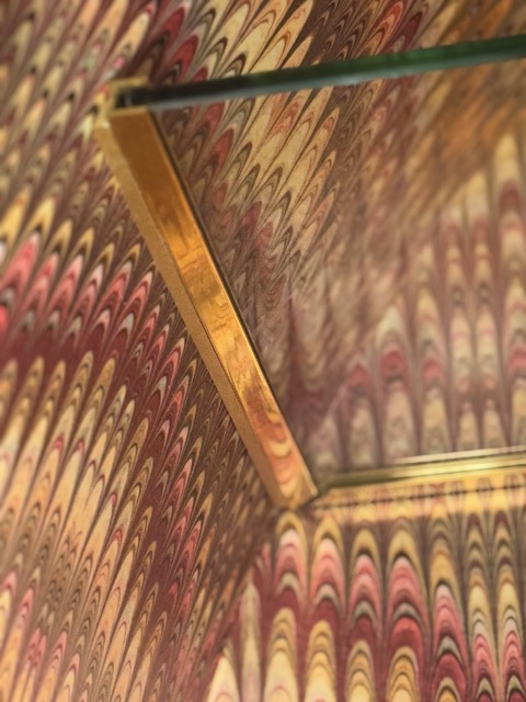 shimming the brass U channel to accommodate the curve